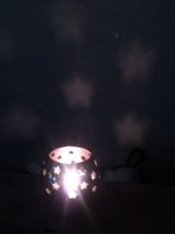Photophore boule en laiton ajouré d'étoiles