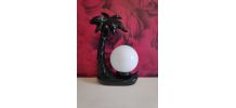 lampe palmier en céramique noire et globe opaline blanc