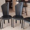 VENDS 4 CHAISES EN CUIR QUIA PARFAIT ETAT NOIR