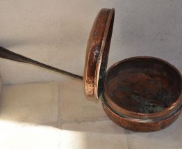 chauffe lit, bassinoire, chaufferette.