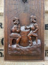Ancien panneau en bois sculpté - Scène de taverne 