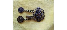 Broche avec pendants et ornée pierre orange