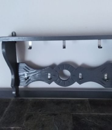 Porte-manteaux mural en bois sculpté 