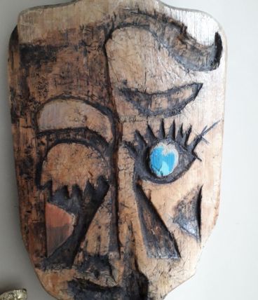 Panneau mural vintage en bois sculpté en forme de tête