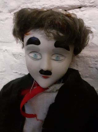 Poupe Charlie chaplin.