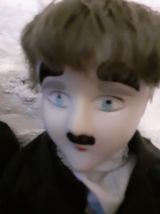 Poupe Charlie chaplin.