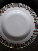 1 lot de 4 assiettes en céramique Limoges des années 50.
