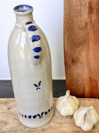 Bouteille en grès à anse