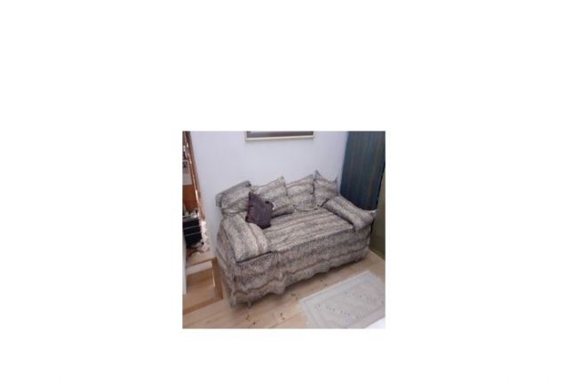 Sofa / canapé 1 Pl  Recouvert cotonnade  léopard,  3  coussi