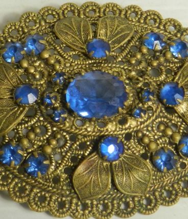 Broche vintage aux perles bleues