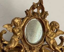 Miroir de château Napoléon lll chérubins et médaillon