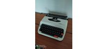 Machine a écrire des années 70 Hermes baby S en bon état