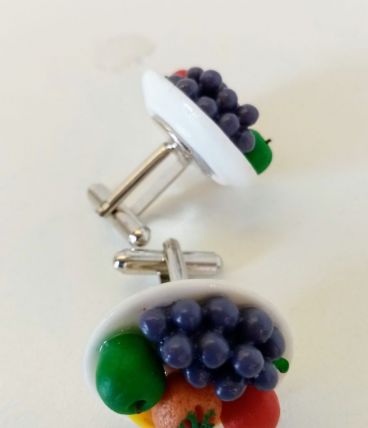 Boutons de manchette assiette de fruits colorés