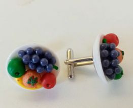Boutons de manchette assiette de fruits colorés