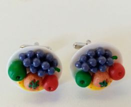 Boutons de manchette assiette de fruits colorés