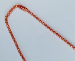 Collier dinosaure orange, Tricératops, fille, garçon