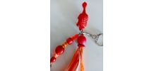 Porte clé dinosaure, bijou de sac, perles, pompon, rubans