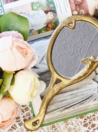 Miroir à main en laiton doré 