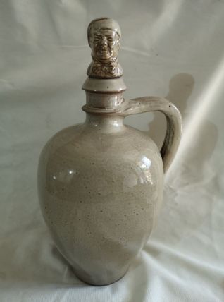 ancienne bouteille en gré bouchon gré tete
