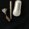 Stylo rétractable plaqué  or pompon et étui d origine 