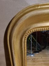 Miroir louis-philippe, début xxème. e à la feuille. En 