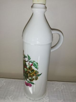 Ancienne bouteille en céramique peinte