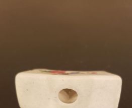 7 repose couverts en porcelaine motif fleurs