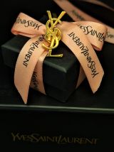 Broche monogramme YSL