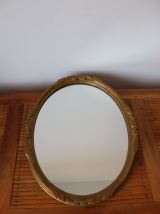 Miroir ovale en bois doré 