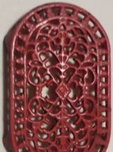 dessous de plat en fonte rouge