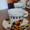 6 Tasses Choky avec pot à lait + une affiche publicitaire