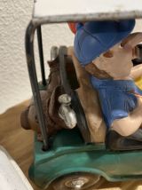 3 figurines "tire lire" humouristique