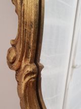 Important miroir en bois doré