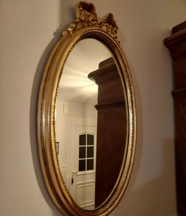 Miroir médaillon doré style Louis XVI