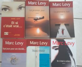 8 Livres Marc Lévy. Chez Laffont.