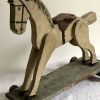 Ancien cheval en bois sur roulettes, jouet ancien