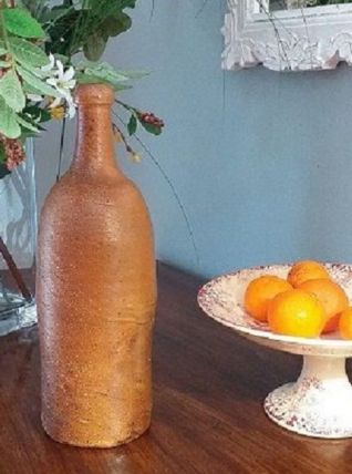 Bouteille ancienne tournée à la main