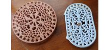 Lot de 2 dessous de plat en fonte 