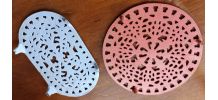 Lot de 2 dessous de plat en fonte 