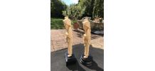 2 sculptures en résine du pêcheur et ses poissons sur socle 