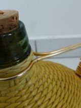 Ancienne carafe/gourde en verre tressée de scoubidou - 2 L
