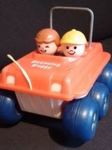 Deux jouets à tirer "Fisher Price"