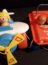 Deux jouets à tirer "Fisher Price"
