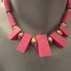 Collier plastique rose
