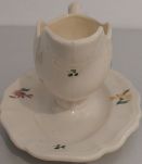Saucière en faience signée DIGOIN SARREGUEMINES. 