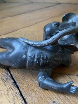 Bougeoir en régule figurant un petit garçon