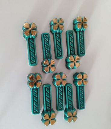 10 porte couteau vert et or, années 60.
