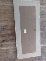 Eau forte signée, cadre marqueterie. 