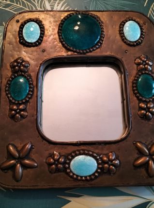 miroir en  pierre et métal