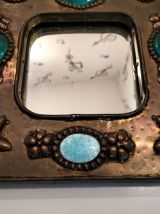 miroir en  pierre et métal